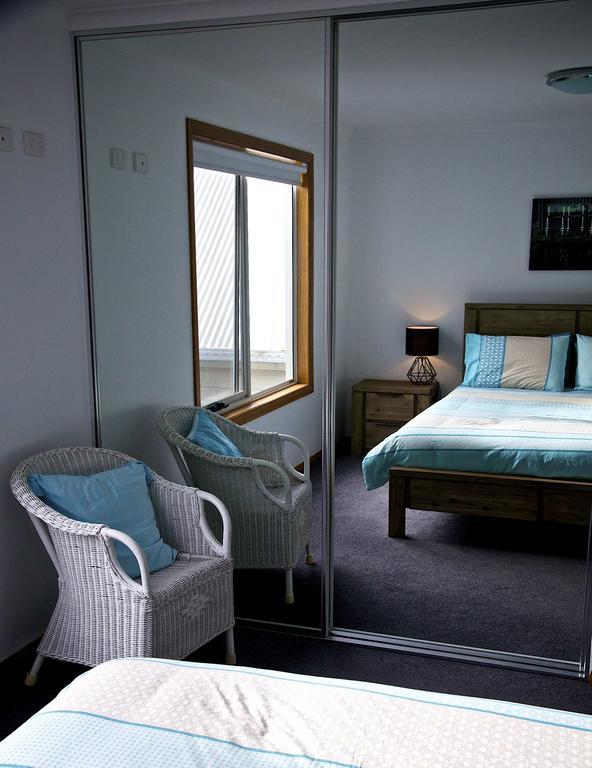 Penguin Beachfront Apartments Phòng bức ảnh